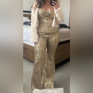 NADINE MERABI Shimmering Gold Sequin Jumpsuit